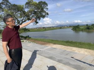 Prof. Zhang Guoxiong pointing out the spot from Taishan where virtually every Chinese railroad worker from Guangdong who came to the US would have begun his journey. He would have boarded a boat at this spot to depart for Hong Kong and from there to California.