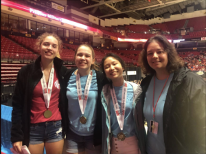 Three students and teacher